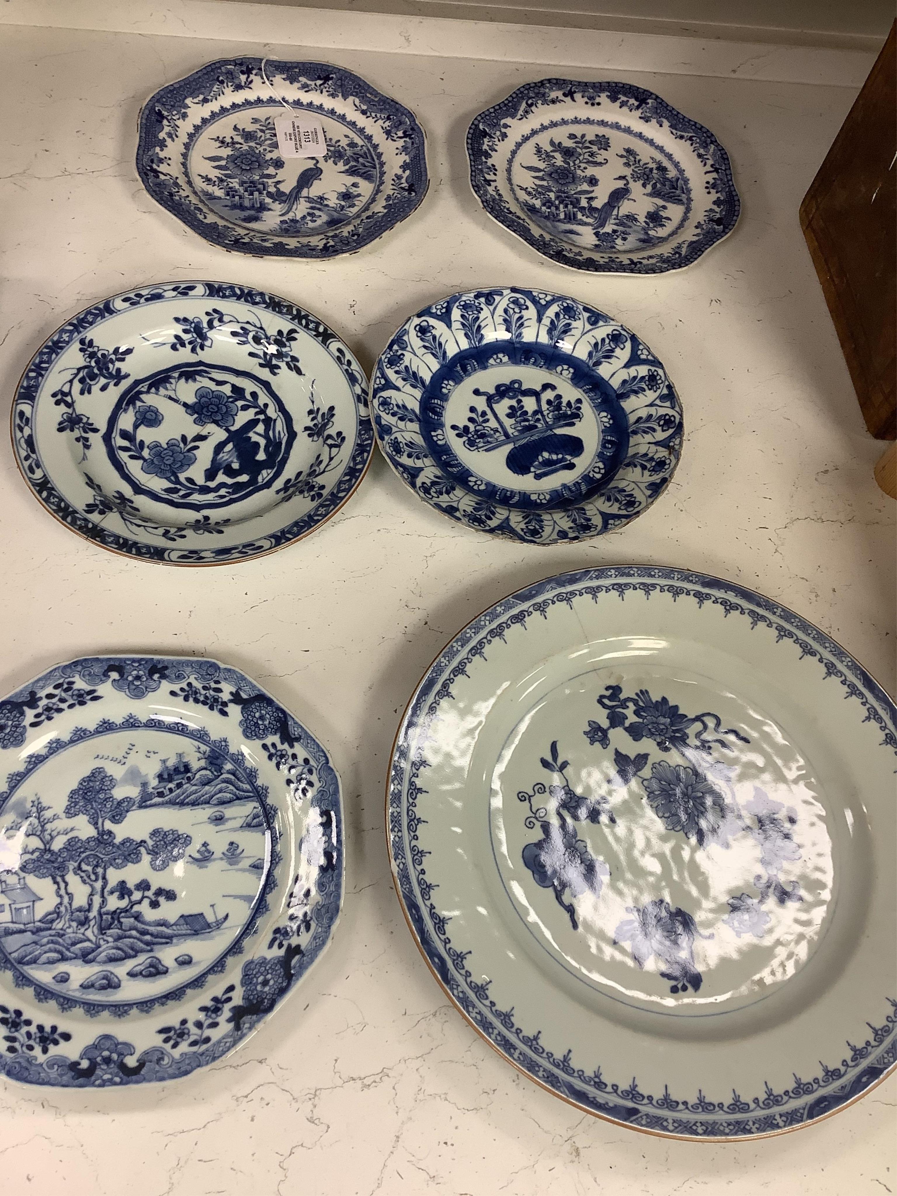 Six 18th century Chinese export blue and white plates, largest 32cm diameter. Condition - poor to fair